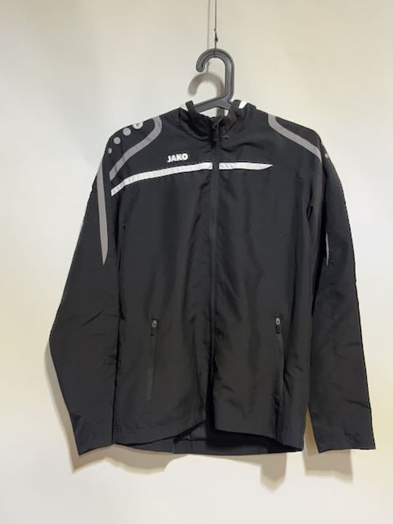 Jako - Team Polyesterjacke schwarz 164