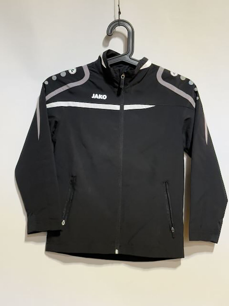 Jako - Team Polyesterjacke schwarz 128